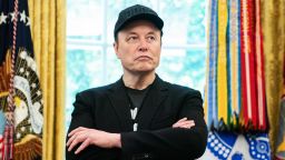 Elon Musk looks on during a news conference with US President Donald Trump in the Oval Office of the White House in Washington, DC, on May 30, 2025. Musk, who stormed into US politics as President Trump's chainsaw-brandishing sidekick, announced on May 28 that he is leaving his role in US government, intended to reduce federal spending, shortly after his first major break with the President over Trump's signature spending bill.