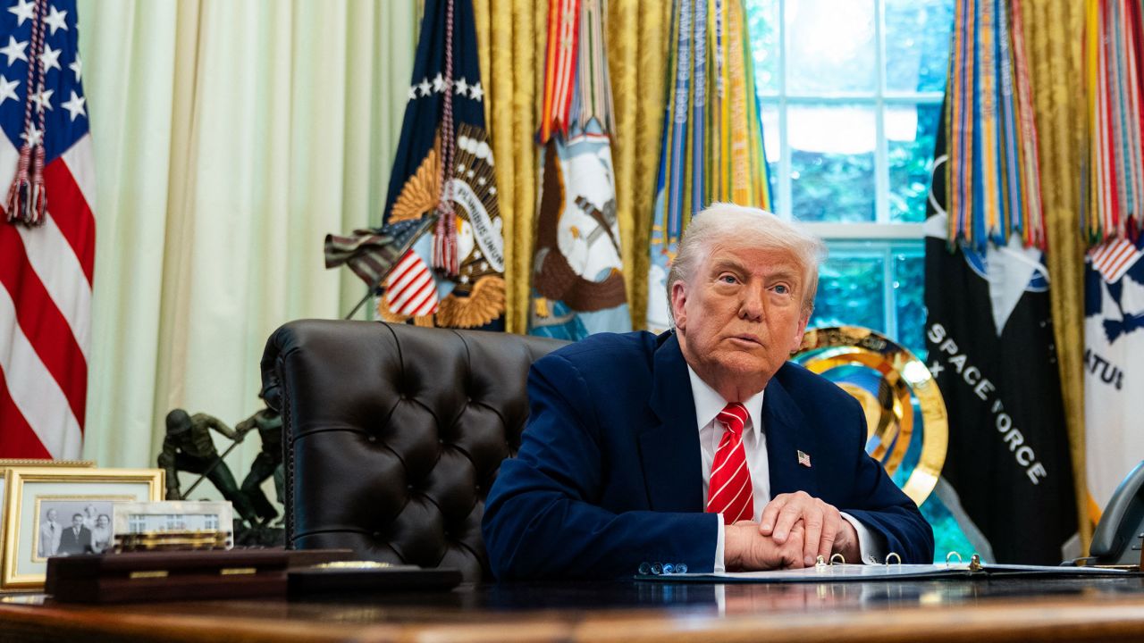 US President Donald Trump speaks during a news conference with Elon Musk in the Oval Office of the White House in Washington, DC, on May 30, 2025. Musk, who stormed into US politics as President Trump's chainsaw-brandishing sidekick, announced on May 28 that he is leaving his role in US government, intended to reduce federal spending, shortly after his first major break with the President over Trump's signature spending bill. (Photo by Allison ROBBERT / AFP) (Photo by ALLISON ROBBERT/AFP via Getty Images)          