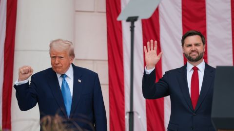 ARLINGTON, VIRGINIA - MAY 26: U.S. President Donald Trump (L) and U.S. Vice President JD Vance greet visitors during the Memorial Day wreath-laying ceremony at the Memorial Amphitheater in Arlington National Cemetery on May 26, 2025 in Arlington, Virginia. Memorial Day is observed on the last Monday in May each year to honor and mourn U.S. military personnel who died while serving in the United States Armed Forces. (Photo by Kayla Bartkowski/Getty Images)