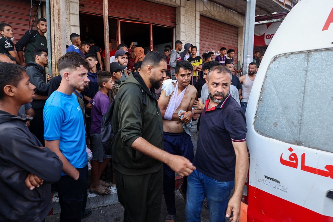 Emergency crews arrive to evacuate injured people after an Israeli drone reportedly opened fire on civilians near an aid distribution point near the Netzarim Corridor, central Gaza, on June 1.