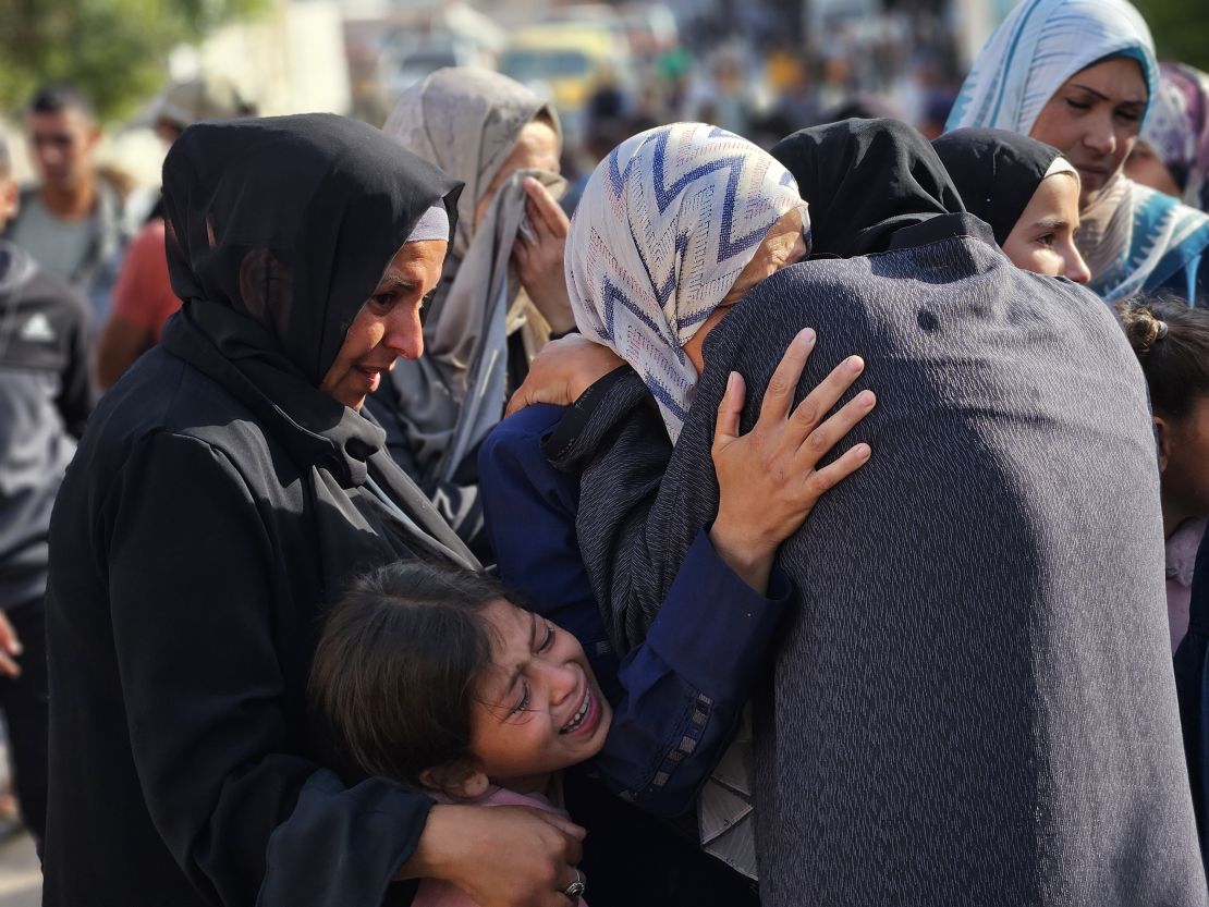 Parents cry the Palestinian bodies on Sunday at Nasser Hospital.