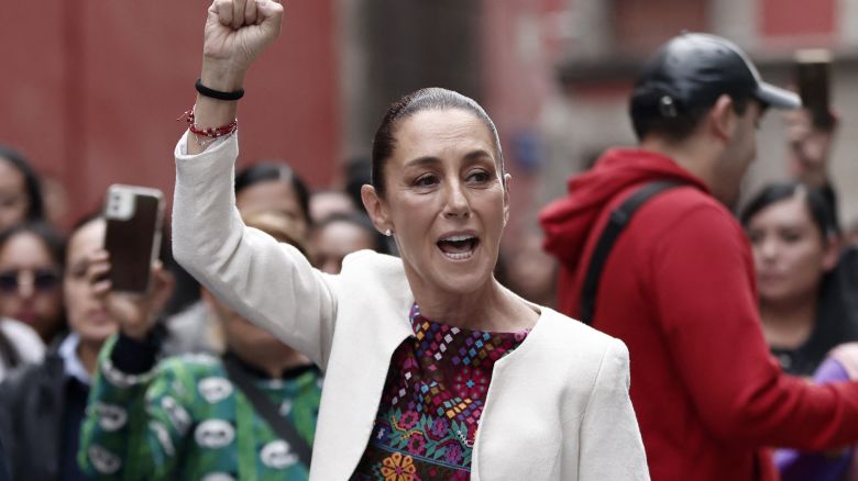 Mexico's President Claudia Sheinbaum greets ers on arrival to vote at a polling station during the world-first Mexican elections for all judges and magistrates in Mexico City on June 1, 2025. Mexico began unprecedented elections Sunday allowing voters to choose their judges at all levels, in a country where drug cartels and other vested interests regularly seek to alter the course of justice. (Photo by Rodrigo Oropeza / AFP) (Photo by RODRIGO OROPEZA/AFP via Getty Images)          