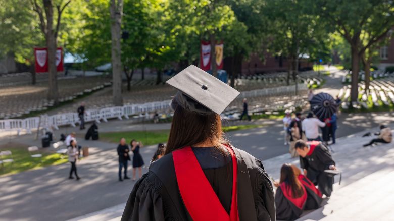 CAMBRIDGE, MASSACHUSETTS - MAY 28: Graduation students, faculty, and family gather in Harvard Yard on May 28, 2025 in Cambridge, Massachusetts. As President Donald Trump intensifies his fight with the nation’s oldest and one of the world’s wealthiest universities, his administration has asked federal agencies on Tuesday to cancel contracts with Harvard University valued at approximately $100 million. (Photo by Spencer Platt/Getty Images)