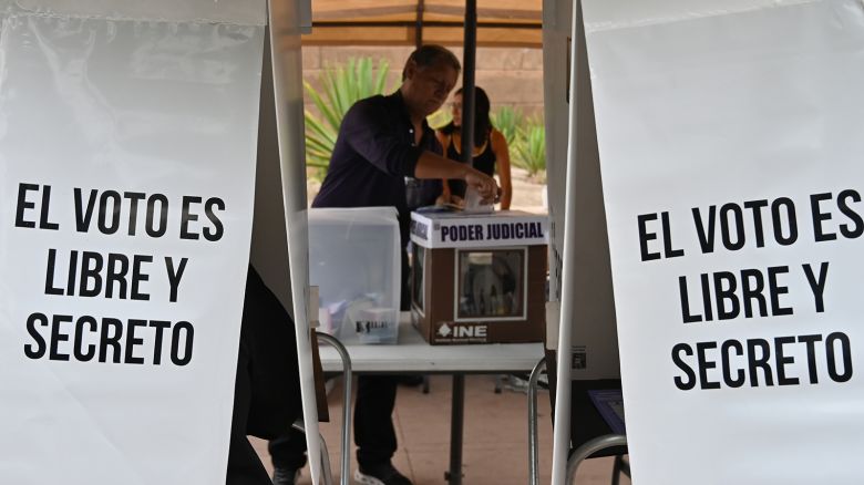 A voter casts his ballot at a ''special'' ballot box zone installed for people living outside the border city of Tijuana in the first Mexican elections to elect all judges and magistrates on June 1, 2025.