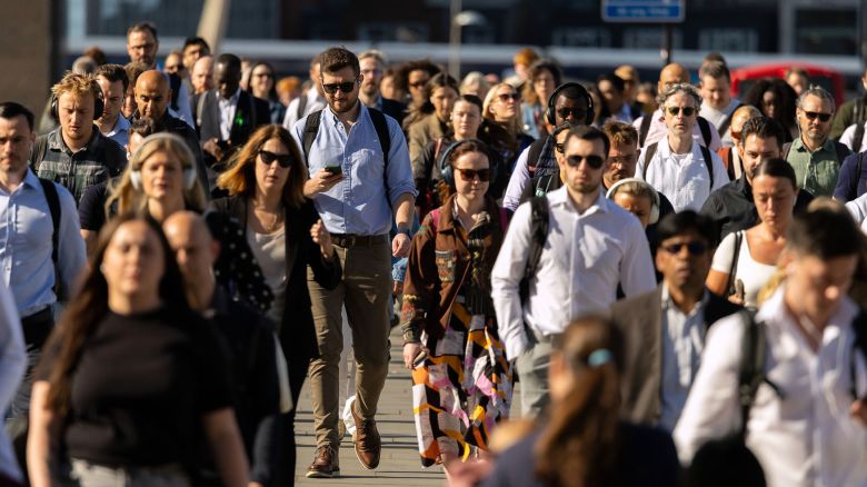 Commuters cross London Bridge, as they make their way to work in London, UK, on Monday, June 2, 2025. At least 10% of the UK's wealthy non-dom population have left the country following tighter tax rules introduced by Prime Minister Keir Starmer's Labour government, according to a new report authored by a former Treasury economist. Photographer: Jason Alden/Bloomberg via Getty Images