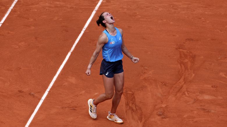 France's Lois Boisson celebrates after winning her women's singles match against US Jessica Pegula on day 9 of the French Open tennis tournament on Court Philippe-Chatrier at the Roland-Garros Complex in Paris on June 2, 2025.