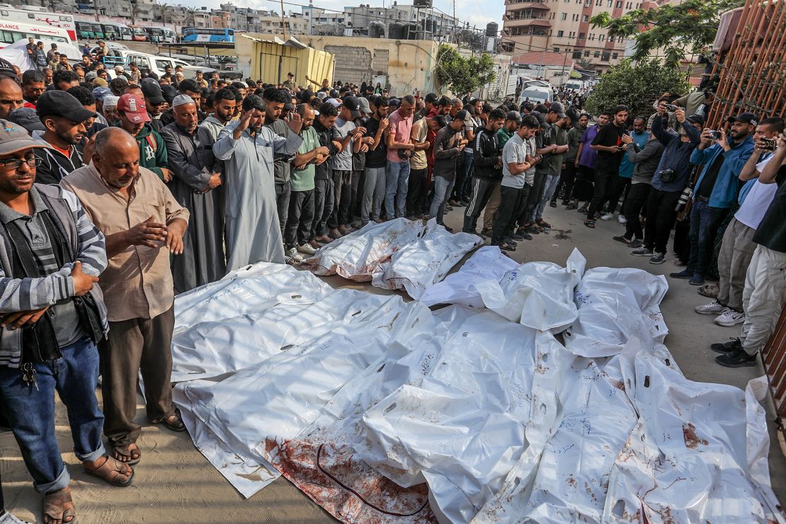 The relatives of Palestinians who lost their lives while on the way to trying to obtain aid from an aid hub in the Al-Alam area of Rafah mourn for their loved ones at Nasser Medical Complex in Khan Younis, Gaza, on Tuesday.