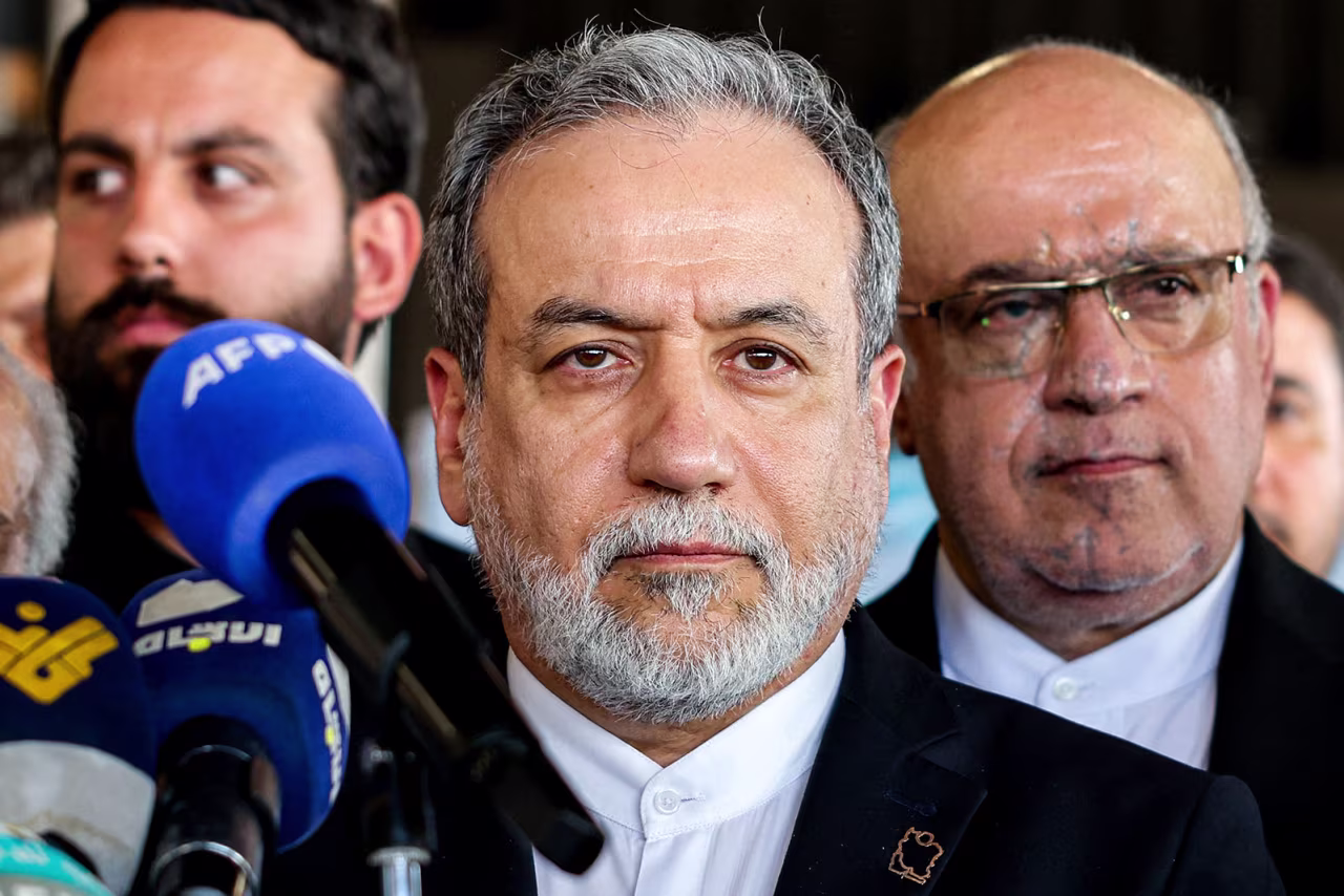 ran's Foreign Minister Abbas Araghchi, center, gives a statement in Beirut's southern suburbs on June 3.