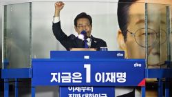 TOPSHOT - Lee Jae-myung, the presidential candidate for South Korea's Democratic Party, acknowledges the crowd as he awaits the final results of the presidential election in Seoul on June 4, 2025. (Photo by ANTHONY WALLACE / AFP) (Photo by ANTHONY WALLACE/AFP via Getty Images)