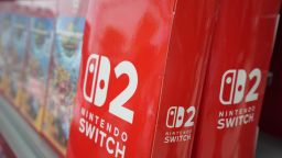 The logo of Nintendo Switch 2 is displayed at an electronics retailer in Tokyo on June 5, 2025. With shops planning midnight launch parties after a run on pre-orders, Nintendo releases the Switch 2 on June 5, hoping to score record early sales for the games console. (Photo by Kazuhiro NOGI / AFP) (Photo by KAZUHIRO NOGI/AFP via Getty Images)