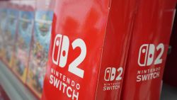 The logo of Nintendo Switch 2 is displayed at an electronics retailer in Tokyo on June 5, 2025. With shops planning midnight launch parties after a run on pre-orders, Nintendo releases the Switch 2 on June 5, hoping to score record early sales for the games console. (Photo by Kazuhiro NOGI / AFP) (Photo by KAZUHIRO NOGI/AFP via Getty Images)