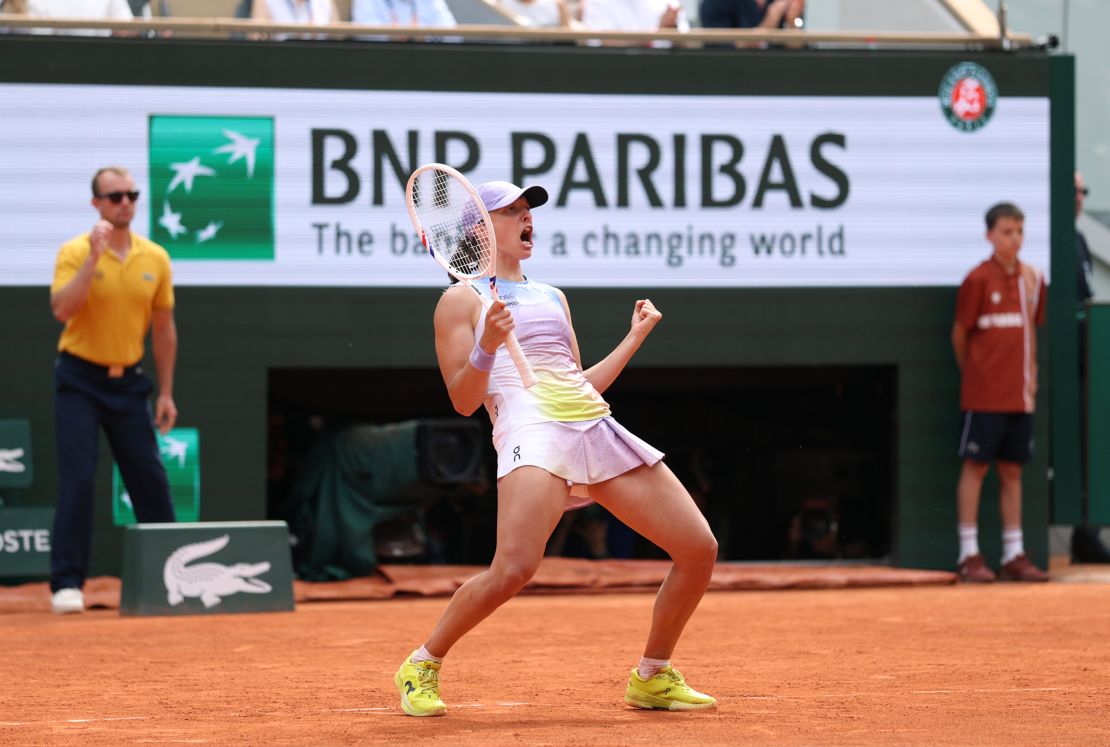 Świątek celebrates match point against Elena Rybakina.