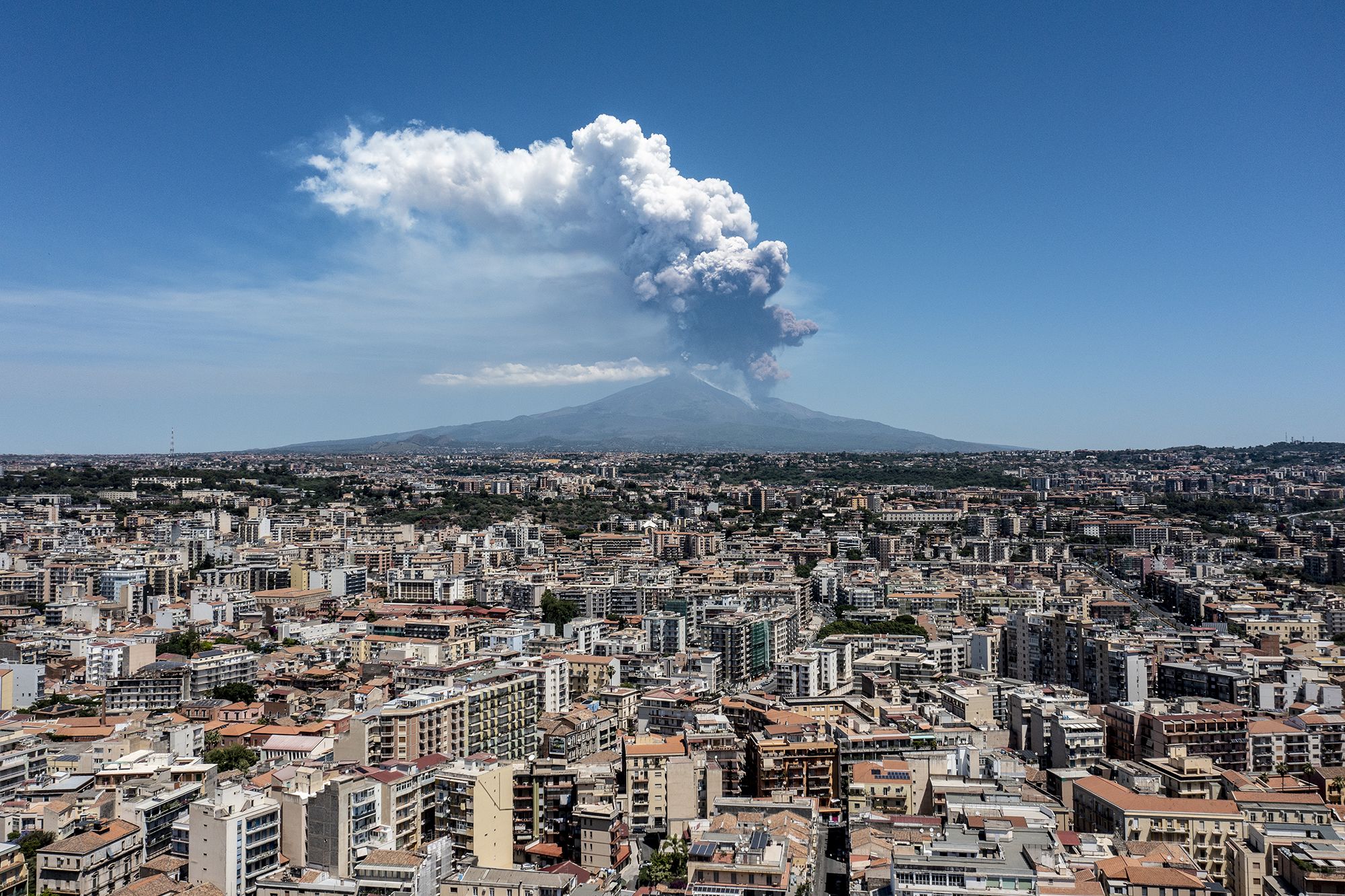 Video shows tourists running for safety as Etna erupts