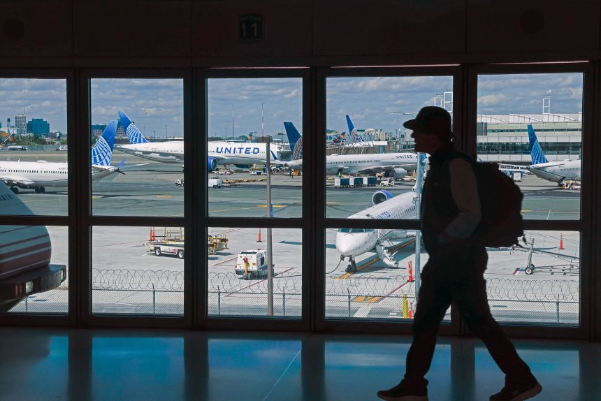 People move through Newark Liberty International Airport in Newark, New Jersey.