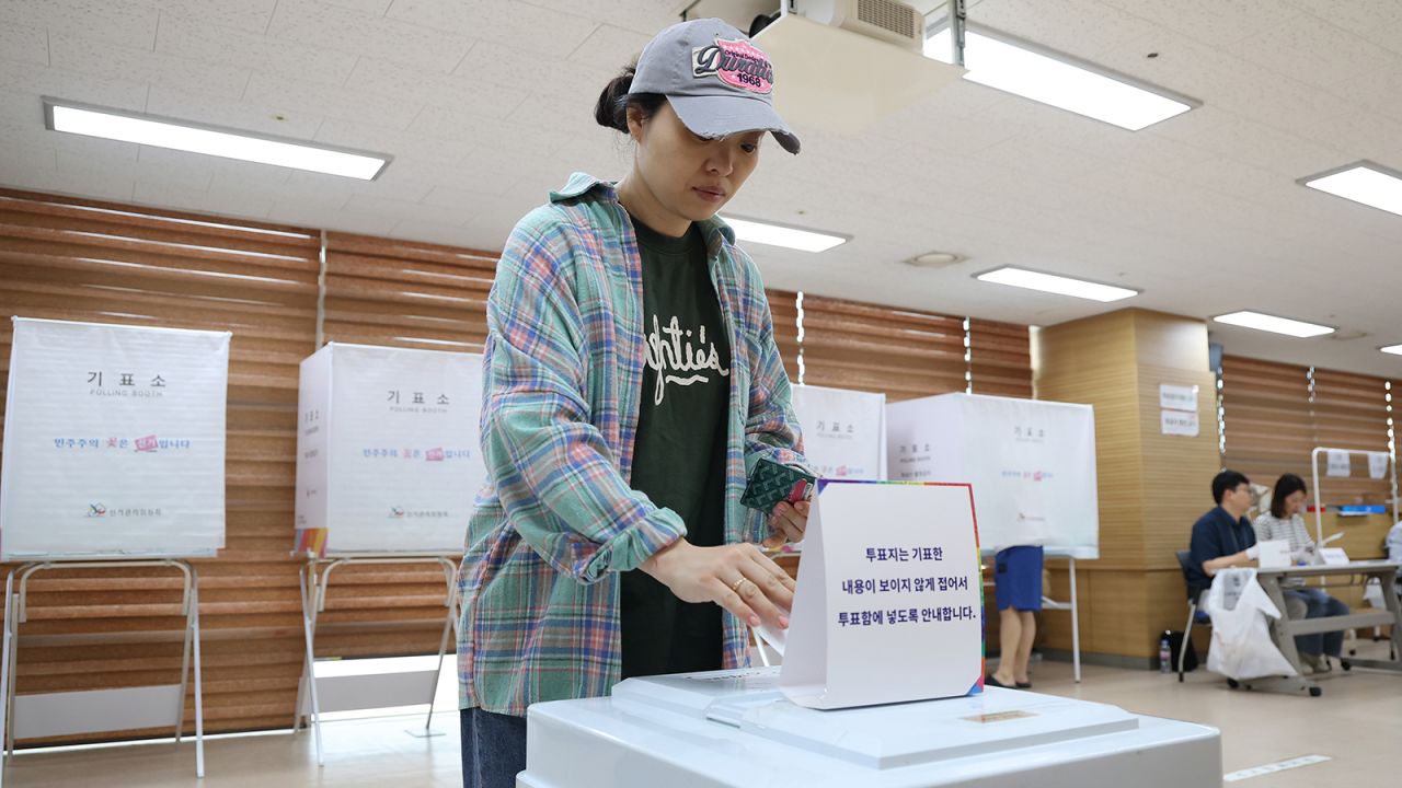 A voter casts a ballot for the presidential election in a polling station on June 3, 2025 in Seoul, South Korea.