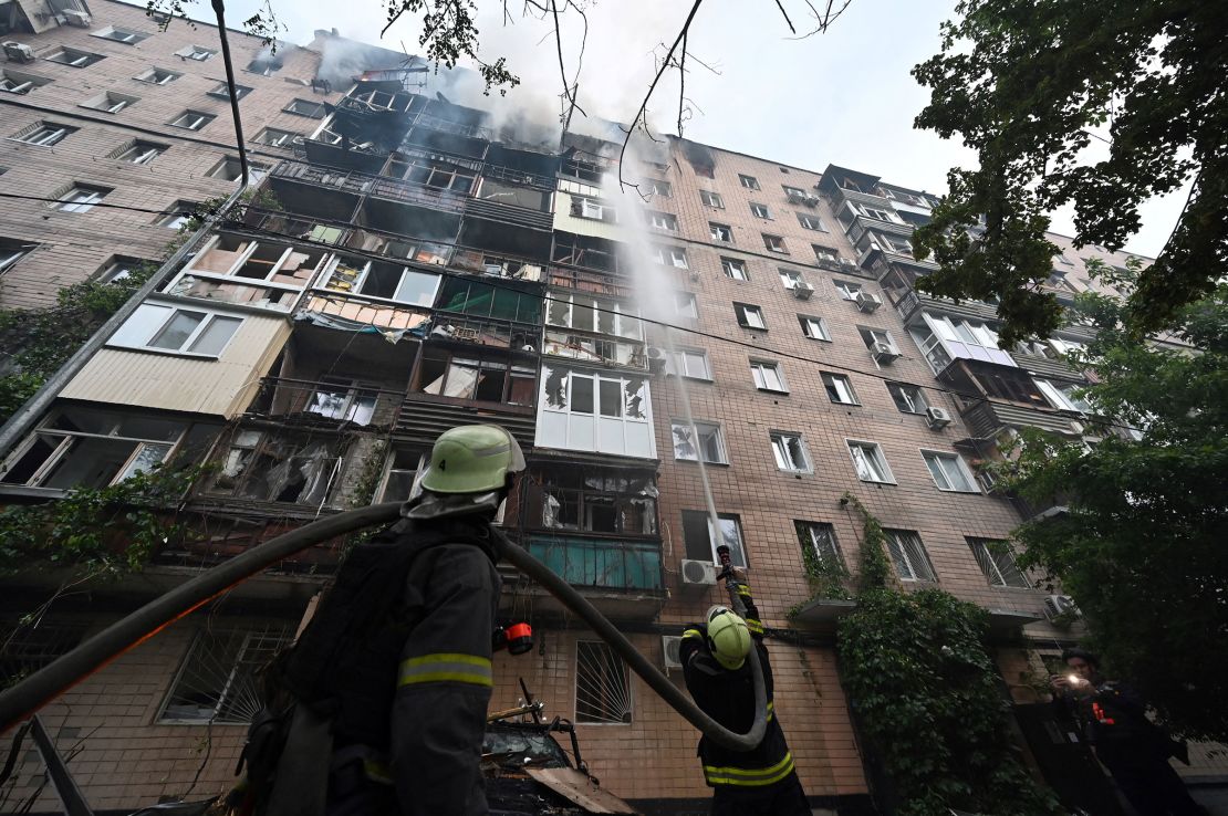 Firefighters extinguish a fire at a multi-story residential building after Russian attacks on Kharkiv, Ukraine, on June 7, 2025.