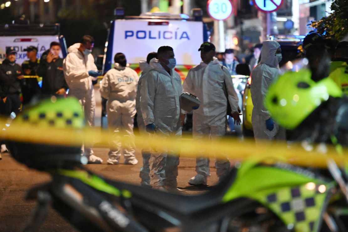 Forensic experts work at the crime scene where Senator Miguel Uribe was shot and wounded in the Modelia neighborhood in Bogota on June 7, 2025.