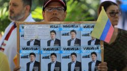 A man holds a sign with propaganda for presidential candidate Miguel Uribe during a protest against violence and in favor of peace in Medellin, Colombia, on June 8, 2025, the day after the attack on Uribe. A prominent Colombian right-wing presidential candidate who was shot during a campaign event in Bogota has successfully undergone initial surgery, the city's mayor said Sunday. Thirty-nine-year-old Senator Miguel Uribe was speaking to ers in the capital when a gunman shot him twice in the head and once in the knee before being detained. (Photo by JAIME SALDARRIAGA / AFP) (Photo by JAIME SALDARRIAGA/AFP via Getty Images)          