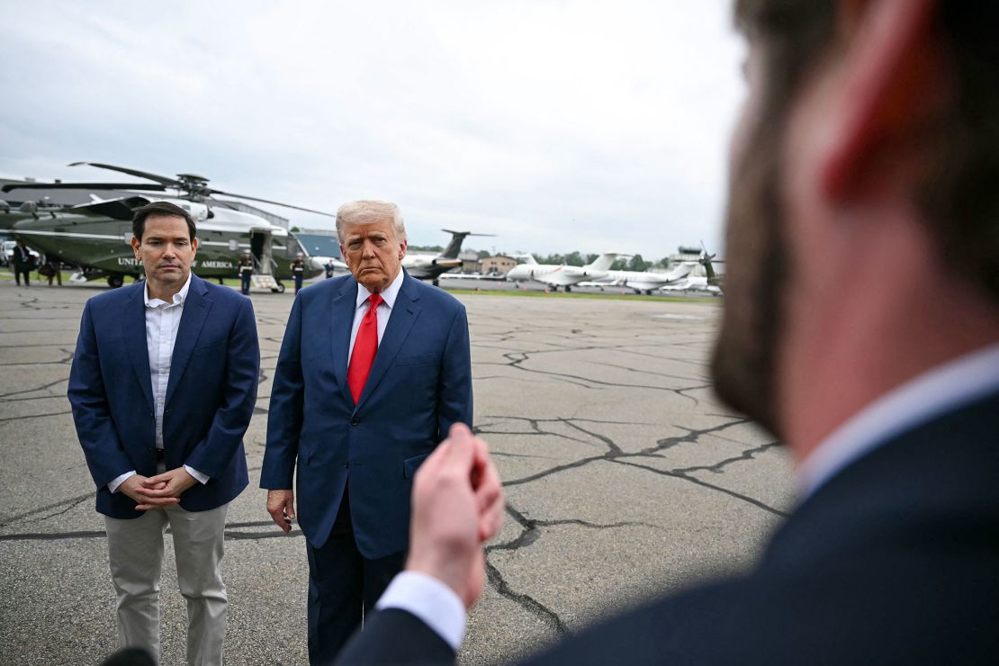 Secretary of State Marco Rubio and President Donald Trump speak to reporters at Morristown Municipal Airport in Morristown, New Jersey, on June 8, while travelling to Camp David.