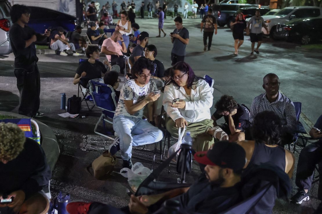 Customers line up outside of a Best Buy store waiting for the midnight opening to purchase Nintendo's Switch 2 console on June 5 in Pembroke Pines, Florida. The Japanese gaming company is releasing the new console eight years after the original version became available.