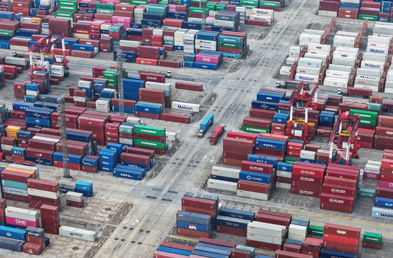 Shipping containers are stacked at a port in Shanghai, China, on June 9.