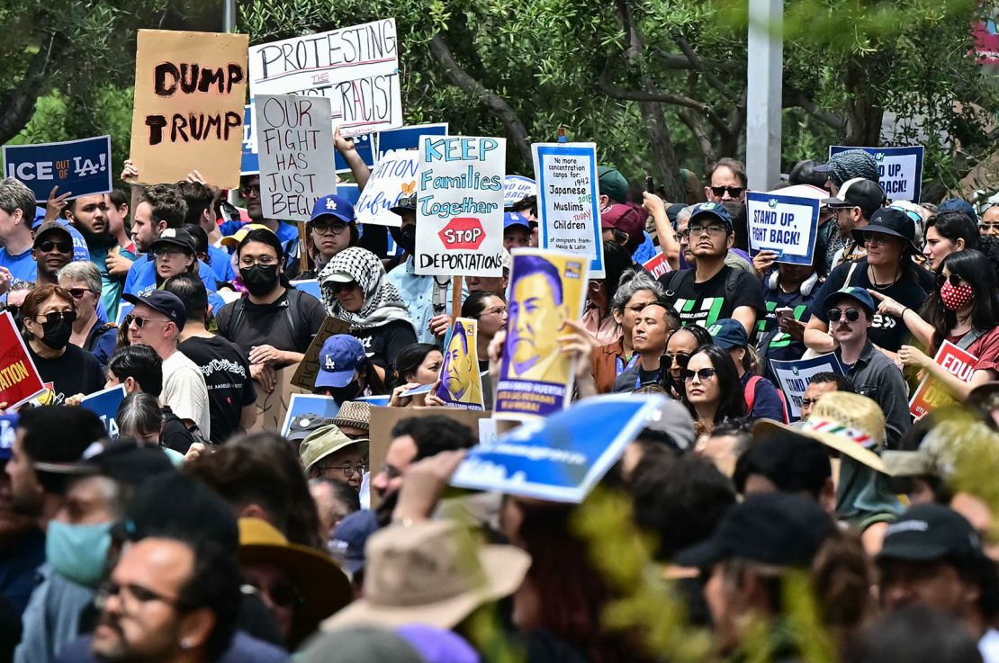 Demonstrators rally against US Immigration and Customs Enforcement and call for the release of union leader David Huerta, President of SEIU California and SEIU-USWW, who was arrested on June 6 during federal immigration operations, at Gloria Molina Grand Park in Los Angeles on Monday.