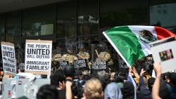 Demonstrators face California National Guard standing guard outside the Federal Building during a protest in response to federal immigration operations in Los Angeles, on June 9, 2025. US President Donald Trump on June 9 ordered active-duty Marines into Los Angeles, vowing those protesting immigration arrests would be "hit harder" than ever. Protests in Los Angeles, home to a large Latino population, broke out on June 6, triggered by immigration raids that resulted in dozens of arrests of what authorities say are illegal migrants and gang . (Photo by RONALDO SCHEMIDT / AFP) (Photo by RONALDO SCHEMIDT/AFP via Getty Images)
