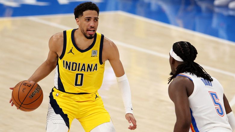 OKLAHOMA CITY, OKLAHOMA - JUNE 05:  Tyrese Haliburton #0 of the Indiana Pacers is defended by Luguentz Dort #5 of the Oklahoma City Thunder during the second quarter in Game One of the 2025 NBA Finals at Paycom Center on June 05, 2025 in Oklahoma City, Oklahoma. NOTE TO USER: User expressly acknowledges and agrees that, by downloading and or using this photograph, User is consenting to the terms and conditions of the Getty Images License Agreement. (Photo by William Purnell/Getty Images)
