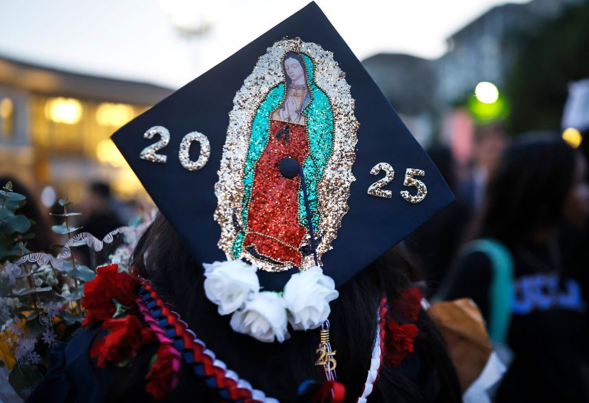 A class of 2025 graduating senior wears a Virgin of Guadalupe image on her cap following the Thurgood Marshall Secondary School graduation ceremony on June 5 in Pasadena.