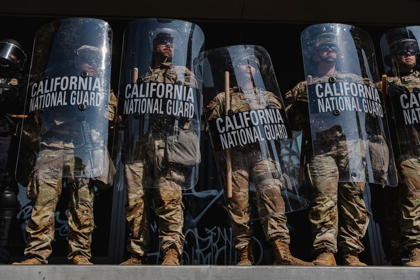 National Guard troops stand outside the Edward Roybal Federal Building in Downtown Los Angeles, California on June 9, 2025.