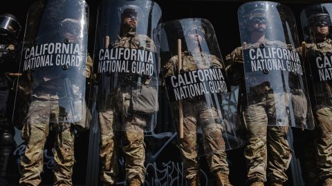 LOS ANGELES, CALIFORNIA - JUNE 09: National Guardsmen stand outside of the Edward Roybal Federal Building on June 9, 2025 in Downtown Los Angeles, California. Tensions in the city remain high after the Trump istration called in the National Guard against the wishes of city leaders. (Photo by Jim Vondruska/Getty Images)
