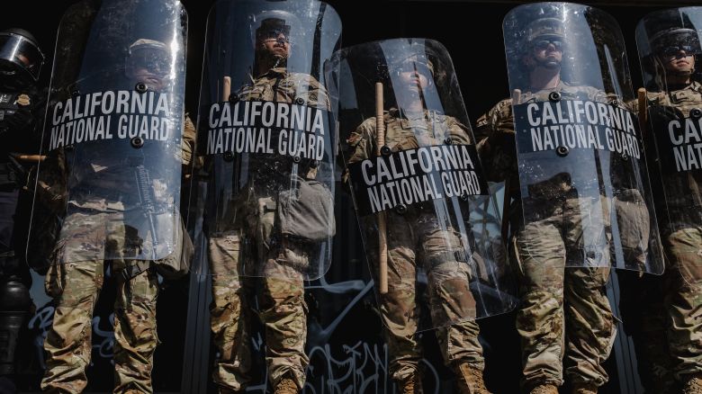 LOS ANGELES, CALIFORNIA - JUNE 09: National Guardsmen stand outside of the Edward Roybal Federal Building on June 9, 2025 in Downtown Los Angeles, California. Tensions in the city remain high after the Trump istration called in the National Guard against the wishes of city leaders. (Photo by Jim Vondruska/Getty Images)