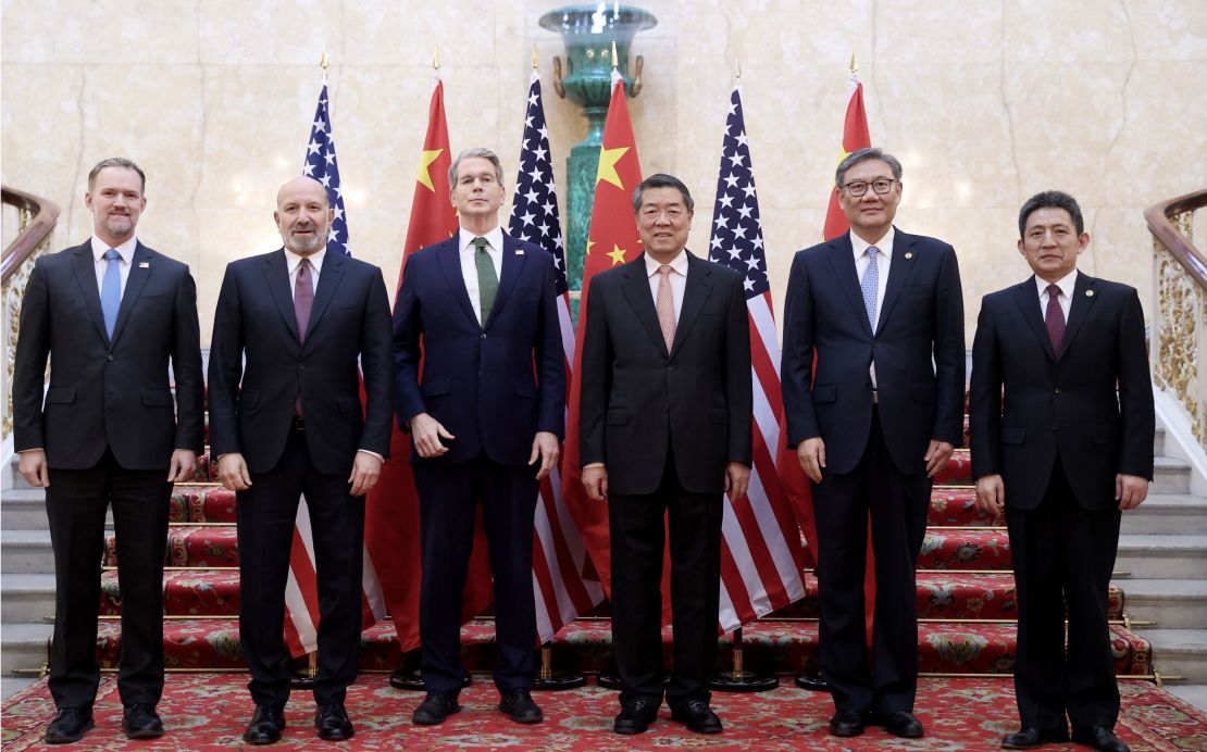 American and Chinese trade negotiators pose for a group photo prior to the start of their meetings in London on June 9.