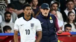 England's head coach Thomas Tuchel, right, speaks to midfielder Jude Bellingham as he prepares to enter the pitch during the international friendly football match between England and Senegal at the City Ground stadium, in Nottingham, England, on June 10, 2025.