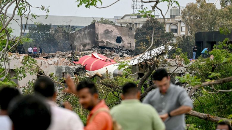 Debris of Air India flight 171 is pictured after it crashed in a residential area near the airport in Ahmedabad on June 13, 2025. Rescue teams with sniffer dogs combed the crash site on June 13 of a London-bound passenger jet which ploughed into a residential area of India's Ahmedabad city, killing at least 265 people on board and on the ground. (Photo by Punit PARANJPE / AFP) (Photo by PUNIT PARANJPE/AFP via Getty Images)          