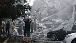TEHRAN, IRAN - JUNE 13: People look over damage to buildings in Nobonyad Square following Israeli airstrikes on June 13, 2025 in Tehran, Iran. Iran's three top military generals were killed in the attacks that also targeted nuclear and military facilities, according to published reports. Israel described the strikes as preemptive to keep Iran from obtaining nuclear weapons, the reports said.  (Photo by Majid Saeedi/Getty Images)