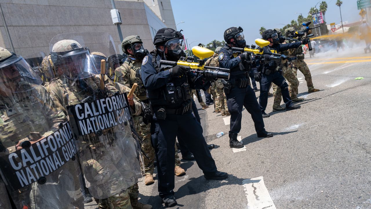 The National Guard, police and protesters stand off outside of a downtown jail in Los Angeles, California, on June 8, 2025.