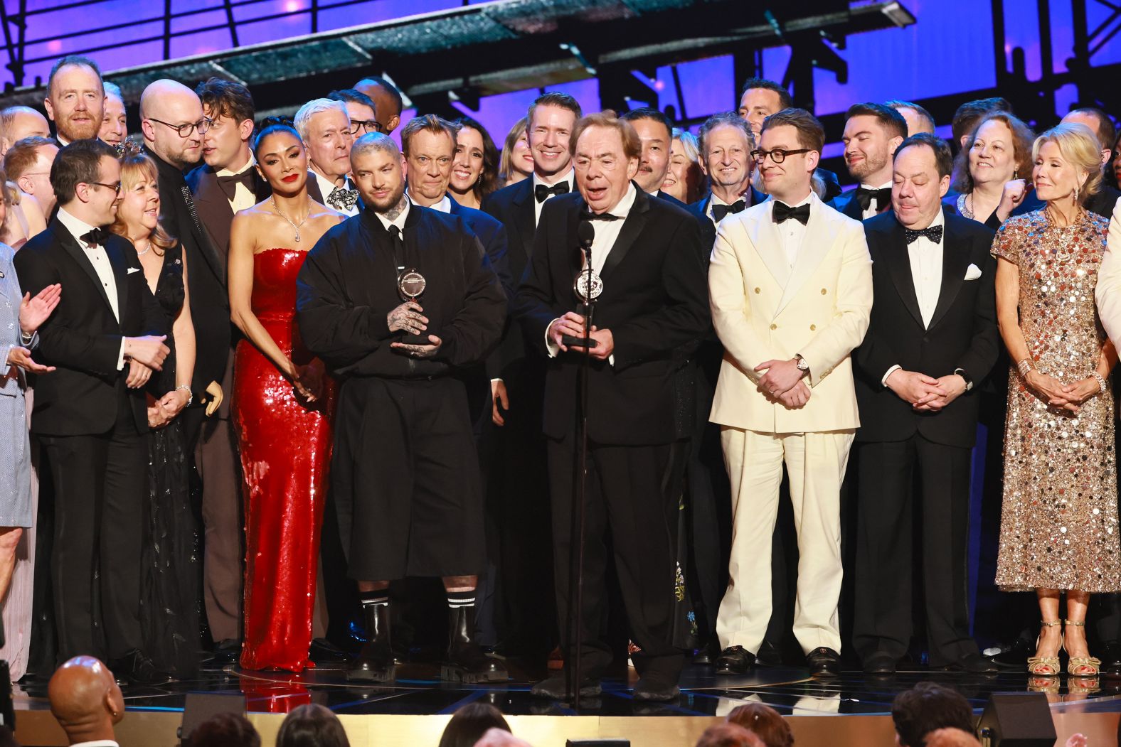 Jamie Lloyd and Andrew Lloyd Webber accept the best revival of a musical award for "Sunset Blvd."