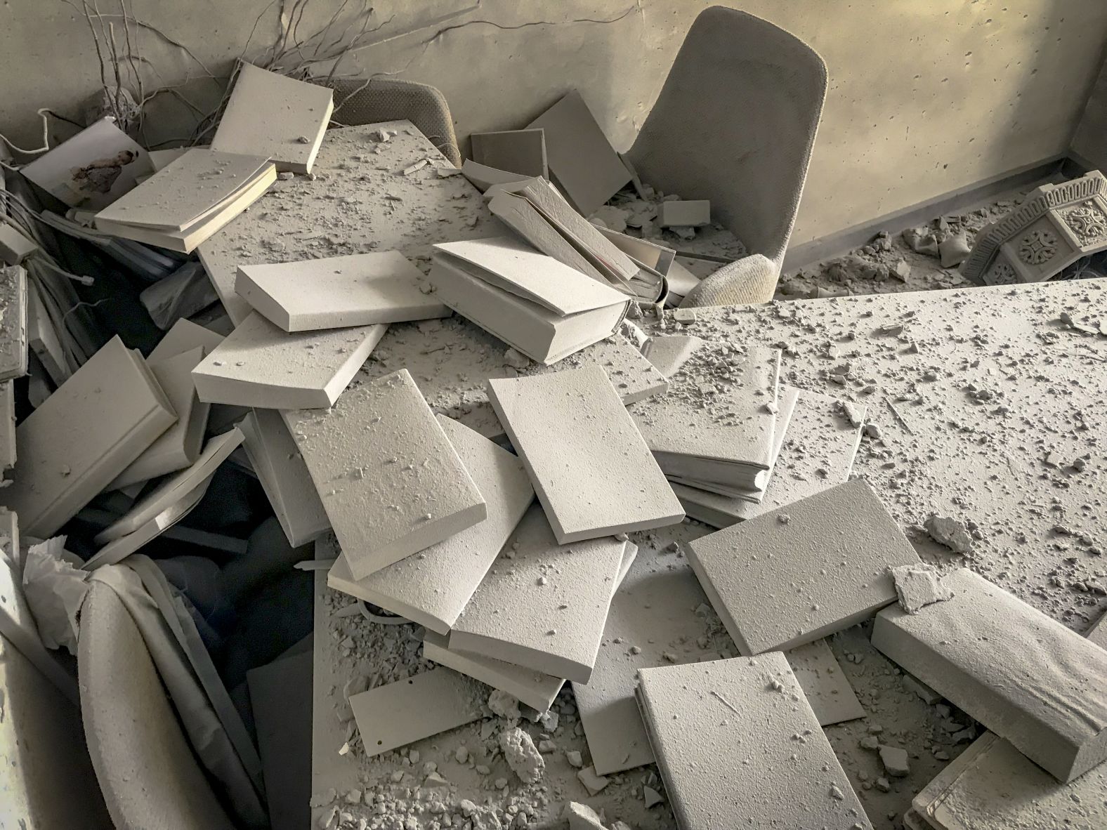Damage is seen inside a building in Tehran on Friday.