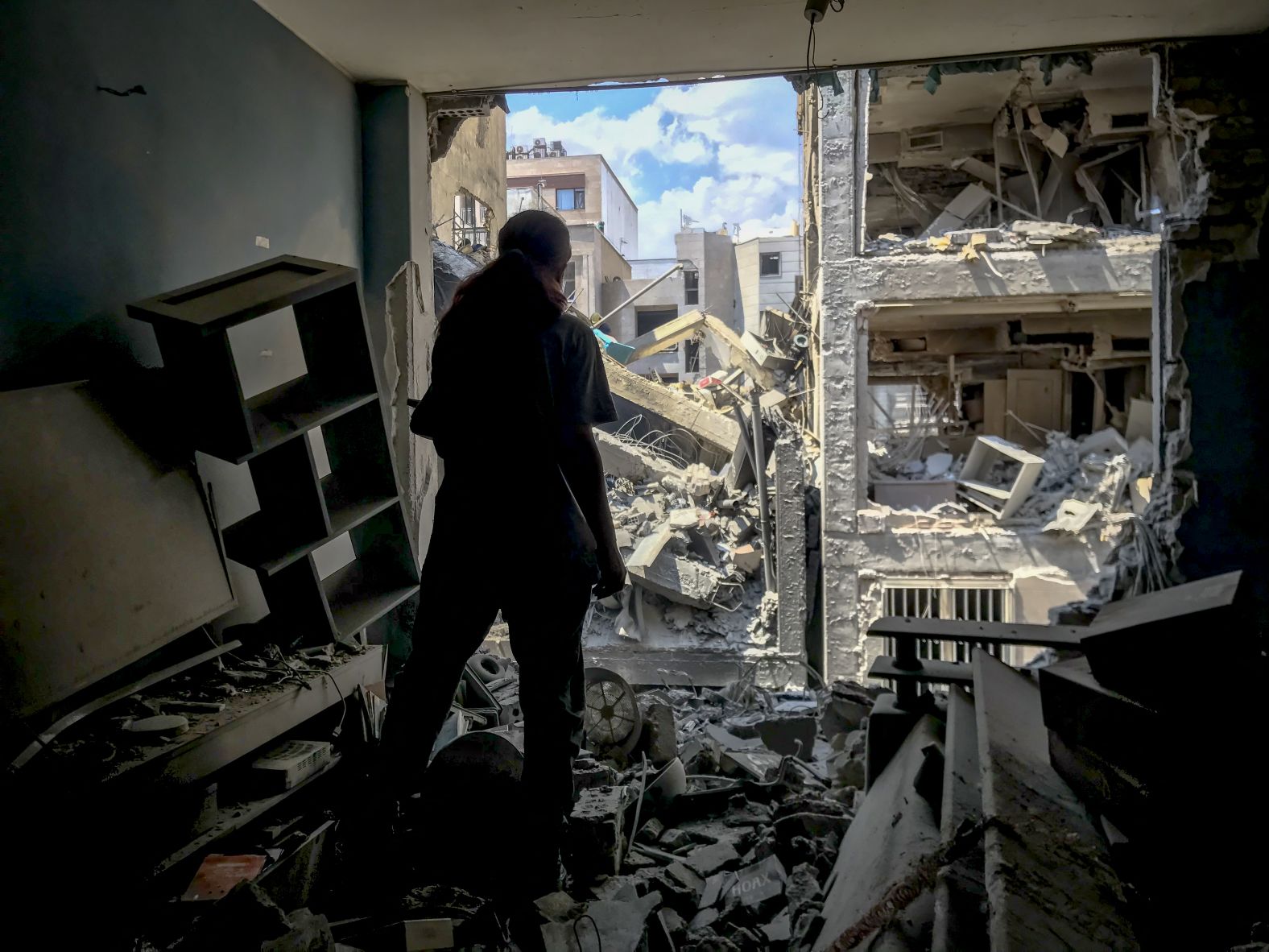 Residential buildings are damaged in Tehran.