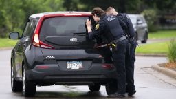 BROOKLYN PARK, MINNESOTA - JUNE 14: Brooklyn Park police officers searche a vehicle entering a neighborhood on June 14, 2025 in Brooklyn Park, Minnesota. Democratic-Farmer-Labor State Rep. Melissa Hortman and her husband were shot and killed this morning. Democratic-Farmer-Labor State Sen. John Hoffman and his wife were also shot and hospitalized in a separate incident. Minnesota Gov. Tim Walz said during a press conference that the shooting "appears to be a politically motivated assassination." (Photo by Stephen Maturen/Getty Images)