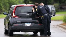 BROOKLYN PARK, MINNESOTA - JUNE 14: Brooklyn Park police officers searche a vehicle entering a neighborhood on June 14, 2025 in Brooklyn Park, Minnesota. Democratic-Farmer-Labor State Rep. Melissa Hortman and her husband were shot and killed this morning. Democratic-Farmer-Labor State Sen. John Hoffman and his wife were also shot and hospitalized in a separate incident. Minnesota Gov. Tim Walz said during a press conference that the shooting "appears to be a politically motivated assassination." (Photo by Stephen Maturen/Getty Images)