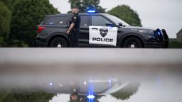 BROOKLYN PARK, MINNESOTA - JUNE 14: A Brooklyn Park police officer looks on as they guard the entrance to a neighborhood on June 14, 2025 in Brooklyn Park, Minnesota. Democratic-Farmer-Labor State Rep. Melissa Hortman and her husband were shot and killed this morning. Democratic-Farmer-Labor State Sen. John Hoffman and his wife were also shot and hospitalized in a separate incident. Minnesota Gov. Tim Walz said during a press conference that the shooting "appears to be a politically motivated assassination." (Photo by Stephen Maturen/Getty Images)