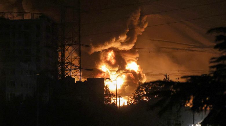 A fire blazes in the oil depots of Shahran, northwest of Tehran, on June 15, 2025. Israel and Iran exchanged fire on June 14, a day after Israel unleashed an unprecedented aerial bombing campaign that Iran said hit its nuclear facilities, "martyred" top commanders and killed dozens of civilians. (Photo by ATTA KENARE / AFP) (Photo by ATTA KENARE/AFP via Getty Images)          