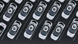 In an aerial view, Waymo cars are seen parked at a Waymo facility in San Francisco, California. Waymo is providing paid rides already in four cities, including San Francisco. It is starting tests in New York City, but not yet providing rides there.