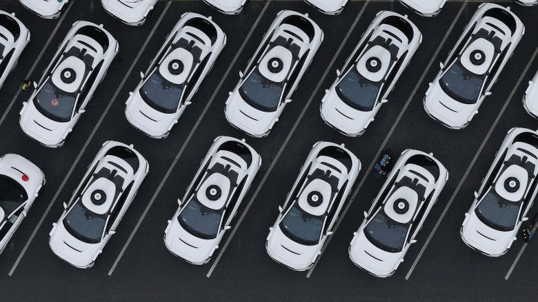 In an aerial view, Waymo cars are seen parked at a Waymo facility on June 10, 2025 in San Francisco, California.