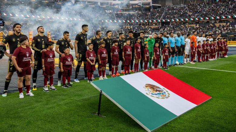 INGLEWOOD, CALIFORNIA - JUNE 14:  Mexico and Dominican Republic players stand for introductions prior to the Gold Cup match at SoFi Stadium on June 14, 2025 in Inglewood, California. Mexico won 3-2. (Photo by Shaun Clark/Getty Images)
