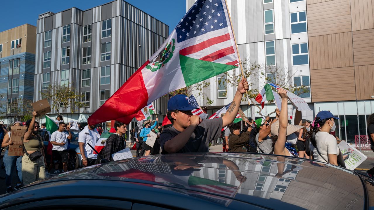 Protesters move through downtown Los Angeles on Wednesday, June 11, as demonstrations continue after a series of immigration raids.