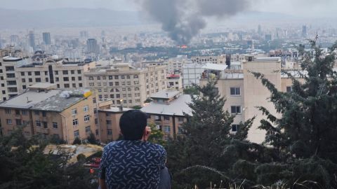 TEHRAN, IRAN - JUNE 16: Smoke rises after a reported Israeli strike on a building used by Islamic Republic of Iran News Network, part of Iran's state TV broadcaster, on June 16, 2025 in Tehran, Iran. Over recent days, Iran has been hit by a series of Israeli airstrikes targeting military and nuclear sites, as well as top military officials, prompting Iran to launch a counterattack. (Photo by Stringer/Getty Images)