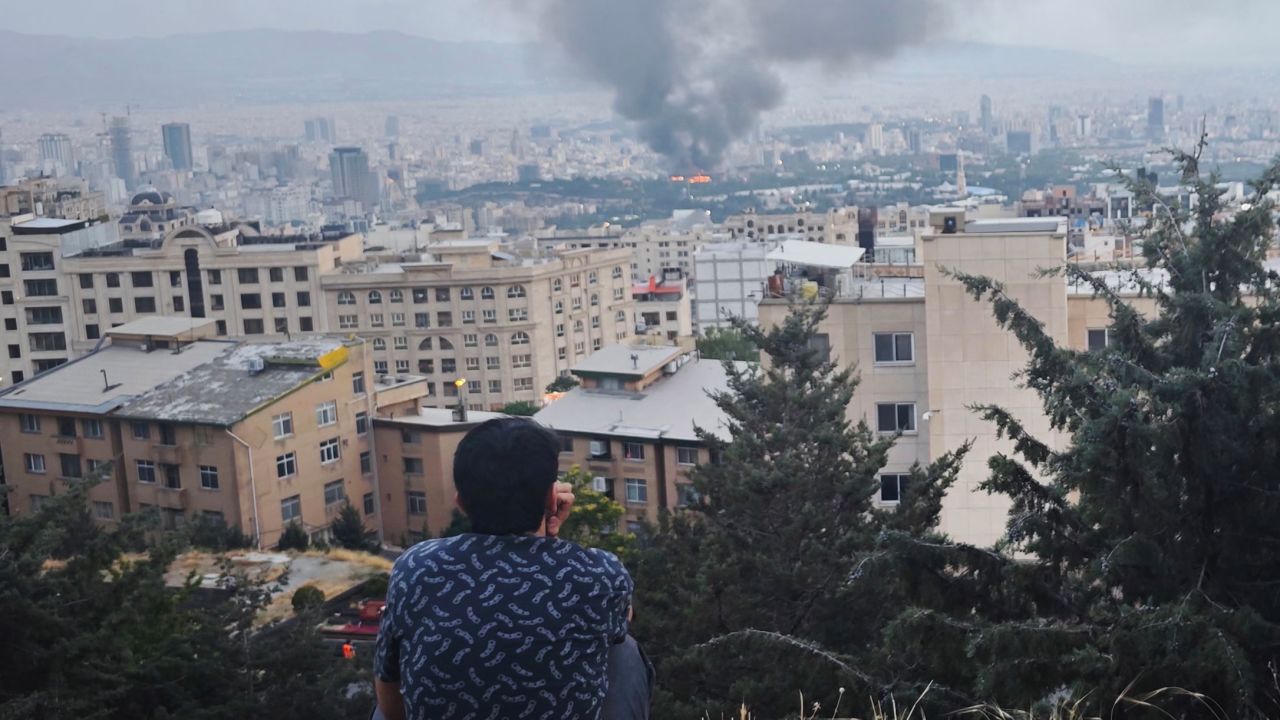 TEHRAN, IRAN - JUNE 16: Smoke rises after a reported Israeli strike on a building used by Islamic Republic of Iran News Network, part of Iran's state TV broadcaster, on June 16, 2025 in Tehran, Iran. Over recent days, Iran has been hit by a series of Israeli airstrikes targeting military and nuclear sites, as well as top military officials, prompting Iran to launch a counterattack. (Photo by Stringer/Getty Images)